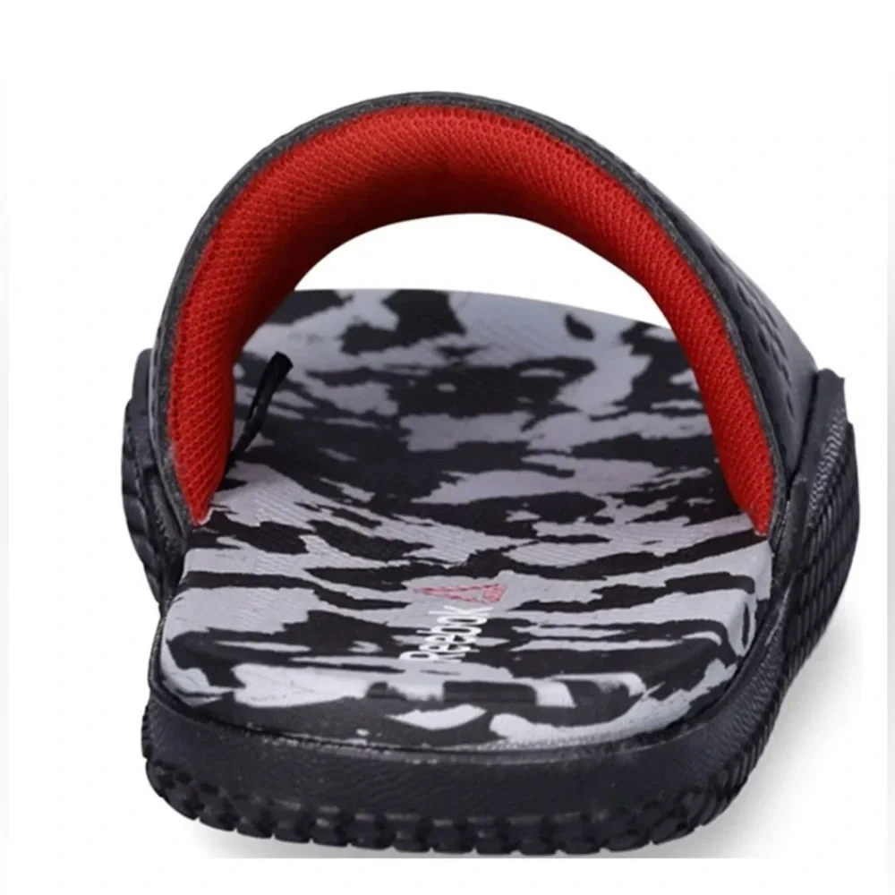 Reebok slides featuring